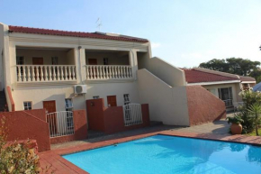 Отель Flamboyant Guest Lodge  Йоханнесбург
